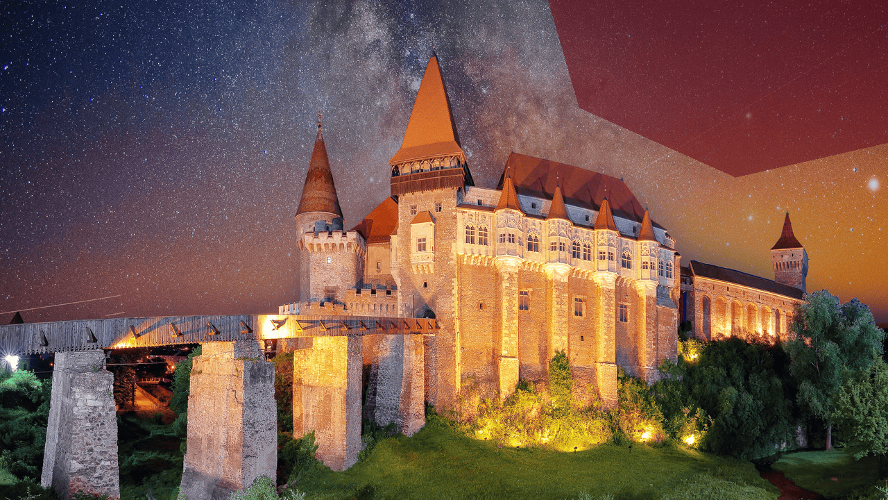 Hunyad-Burg in Rumänien bei Nacht mit Sternenhimmel